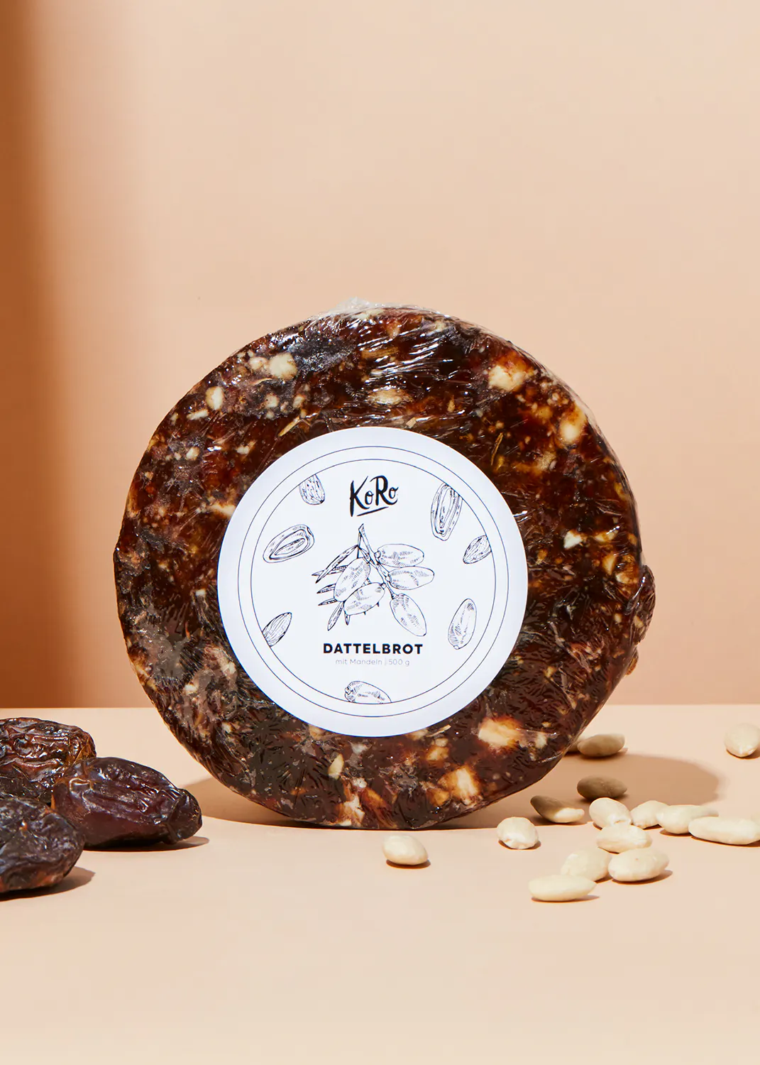 a piece of food with a label that says " dattelbrot " on it