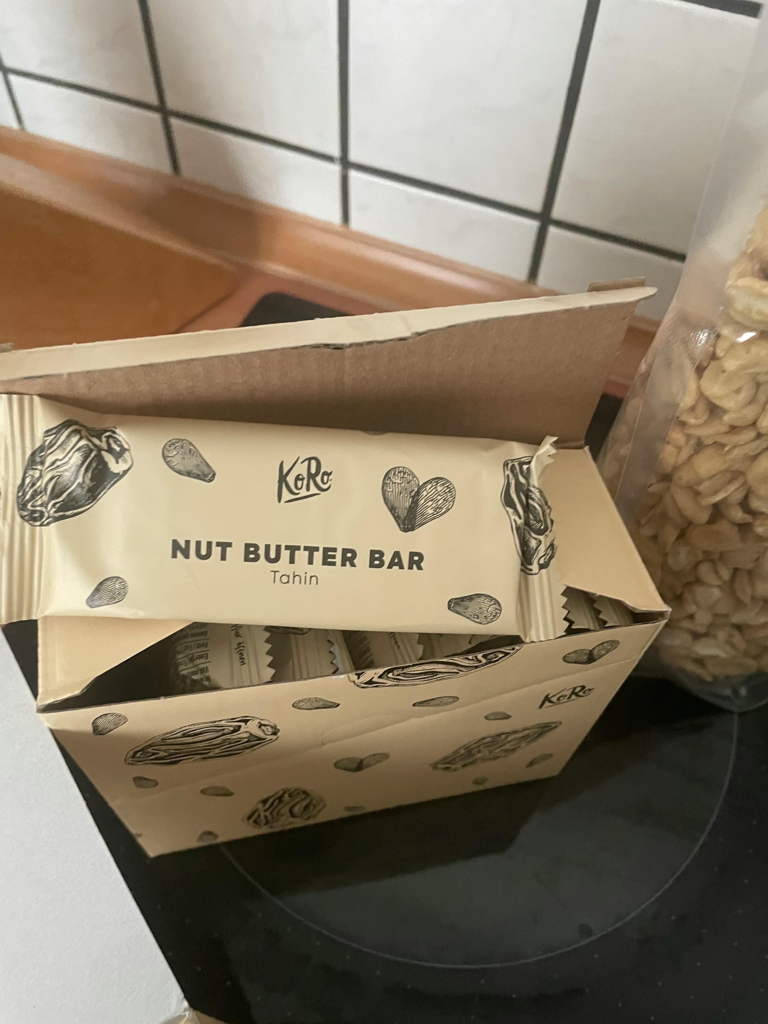 a box of nut butter bars sitting on a counter