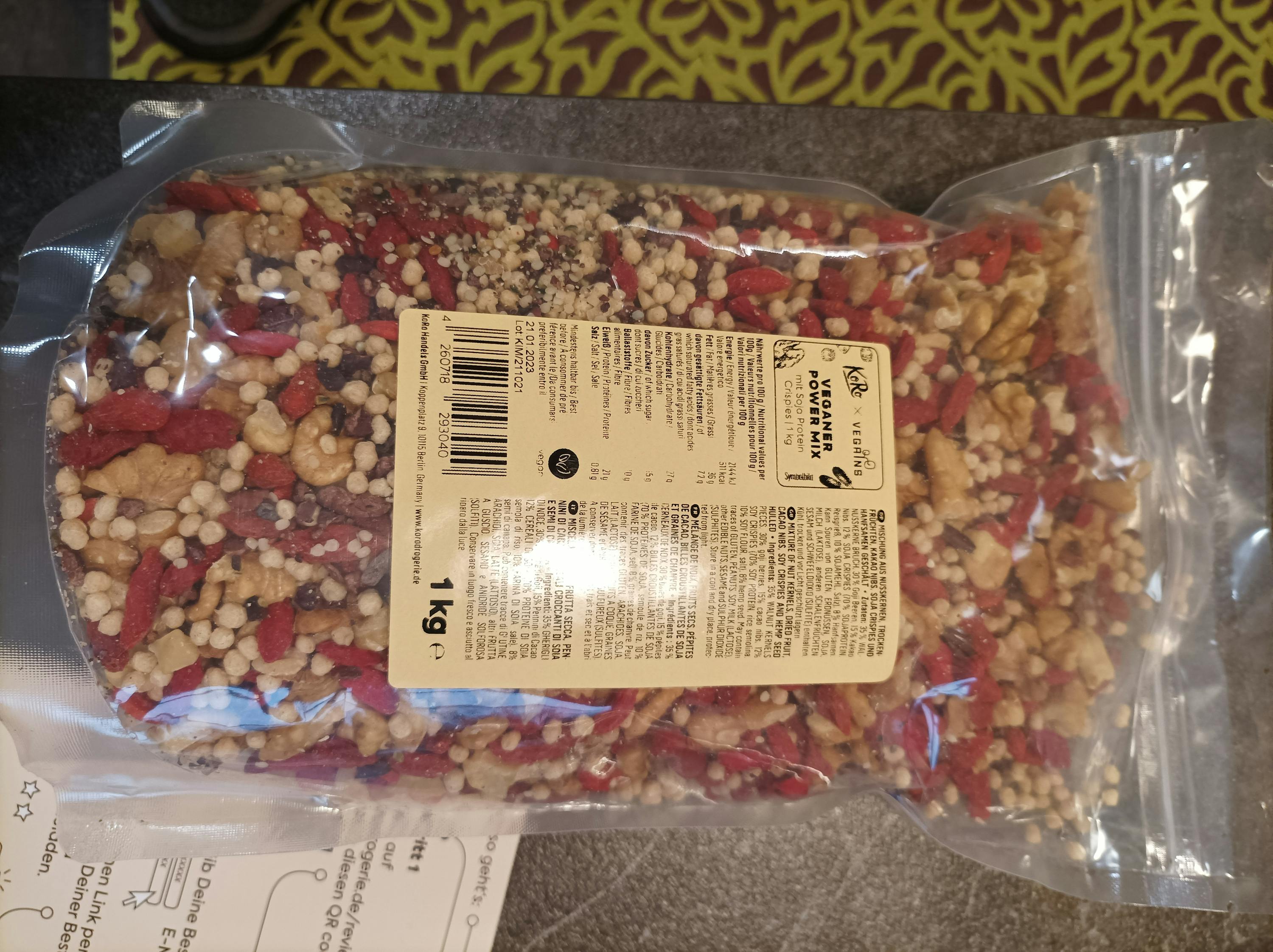 a bag of mixed nuts with a label that says 1 kg