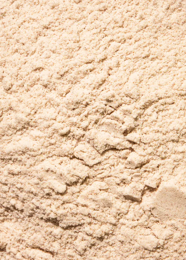 un gros plan d' un tas de poudre beige