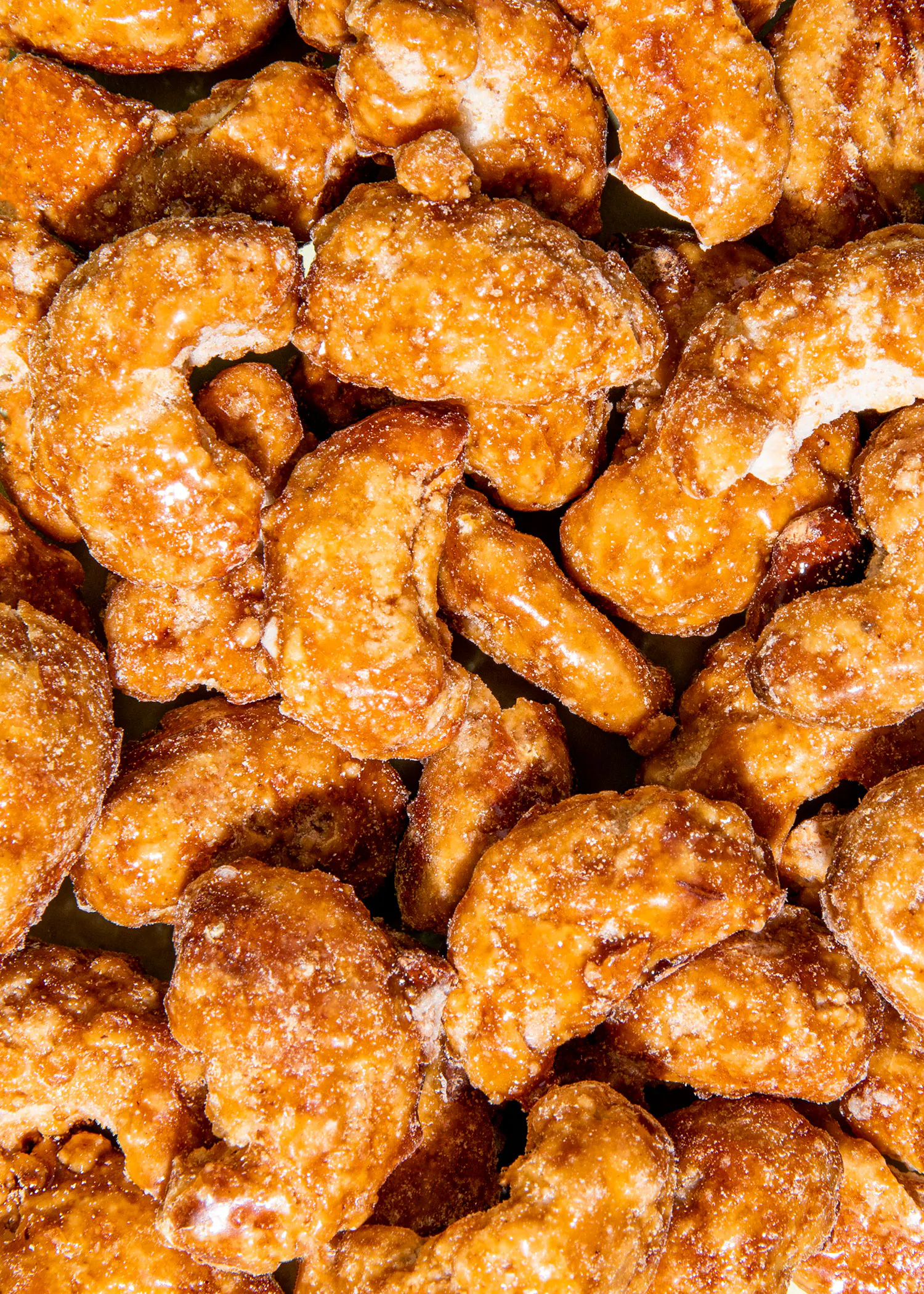 a close up of a pile of fried chicken wings